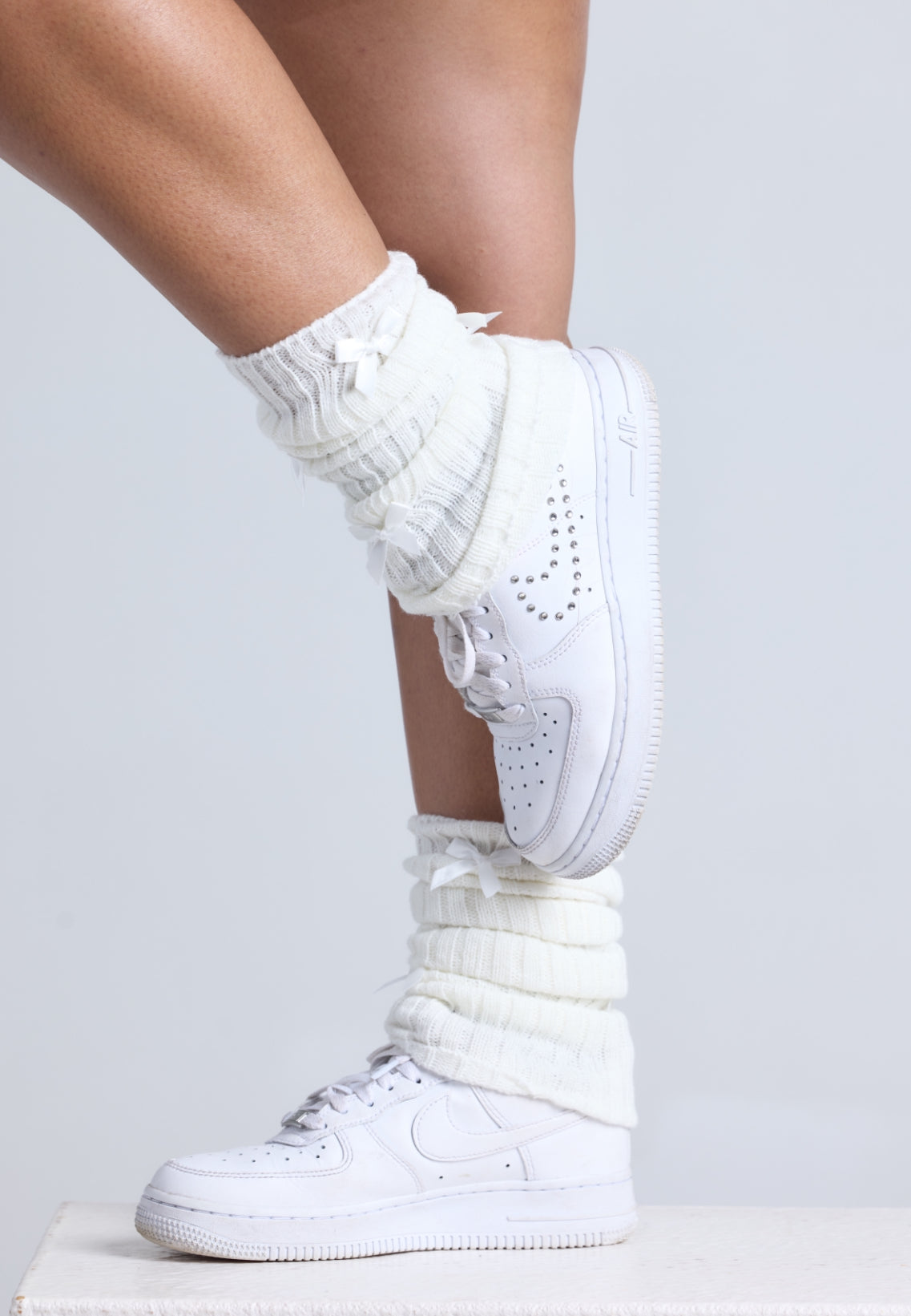 White bow leg warmers