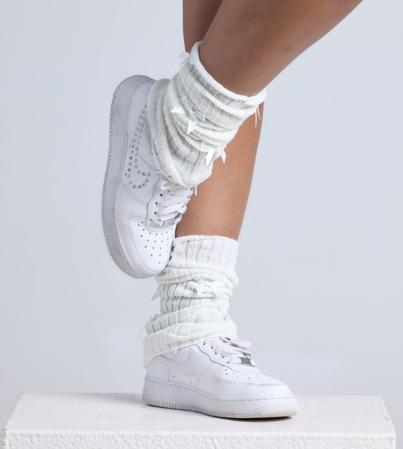 White bow leg warmers